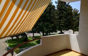Appartamento Trilocale Terrazzo abitabile con tenda da sole